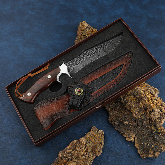 Odin's Edge premium gift box with embossed leather sheath and decorative red snap closure