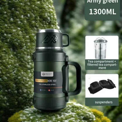 Army Green Frostbear Flask 1300ml stainless steel thermos bottle with tea filter and folding handle. Compact and lightweight vacuum design that keeps beverages hot or cold for up to 72 hours. Great for hiking, camping, and travel.