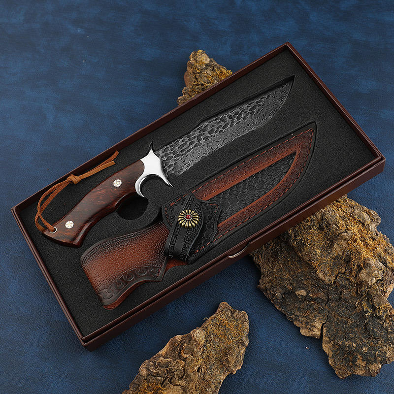 Odin's Edge premium gift box with embossed leather sheath and decorative red snap closure
